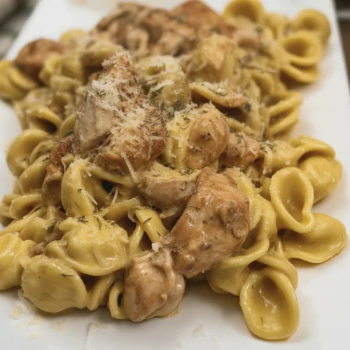 Marry Me Chicken Tortellini - A Creamy Dream Come True! 1 Creamy Marry Me Chicken Tortellini with juicy chicken and sun-dried tomatoes.
